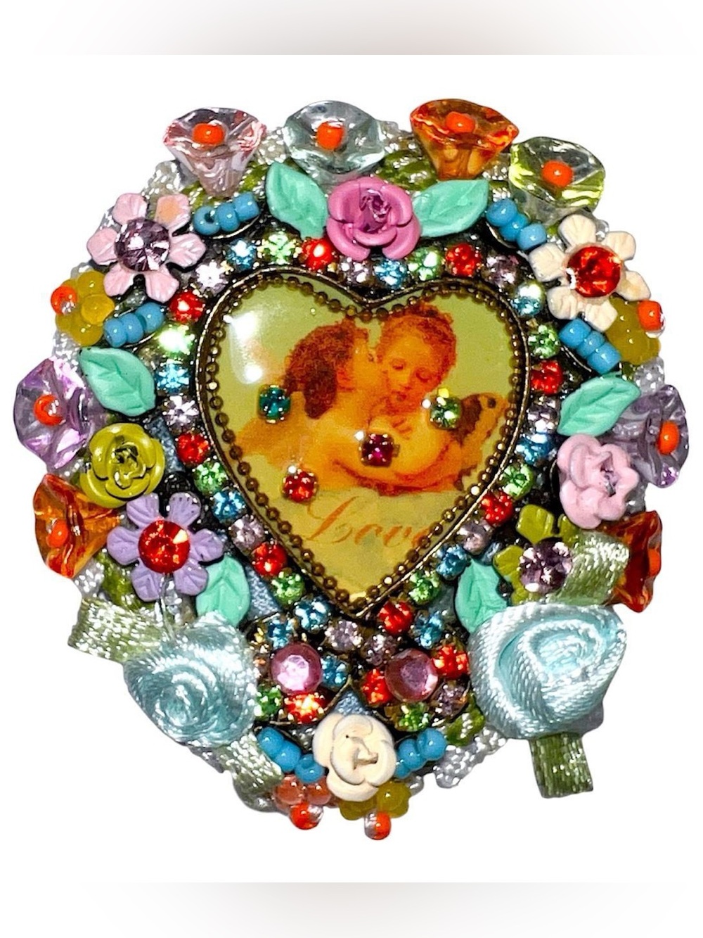 Vintage cherub & flowers brooch